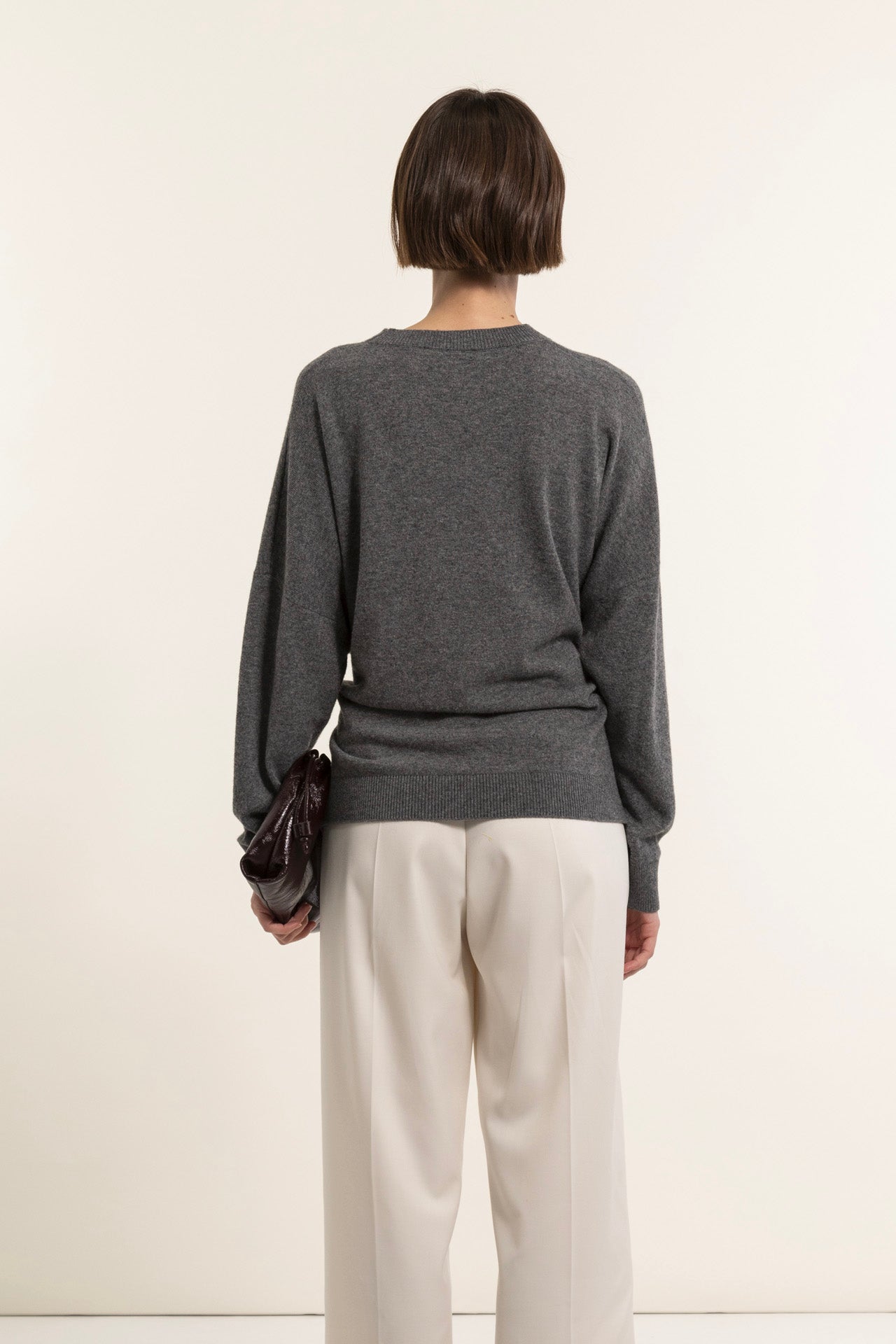 Crew neck sweater in wool blend with front knot