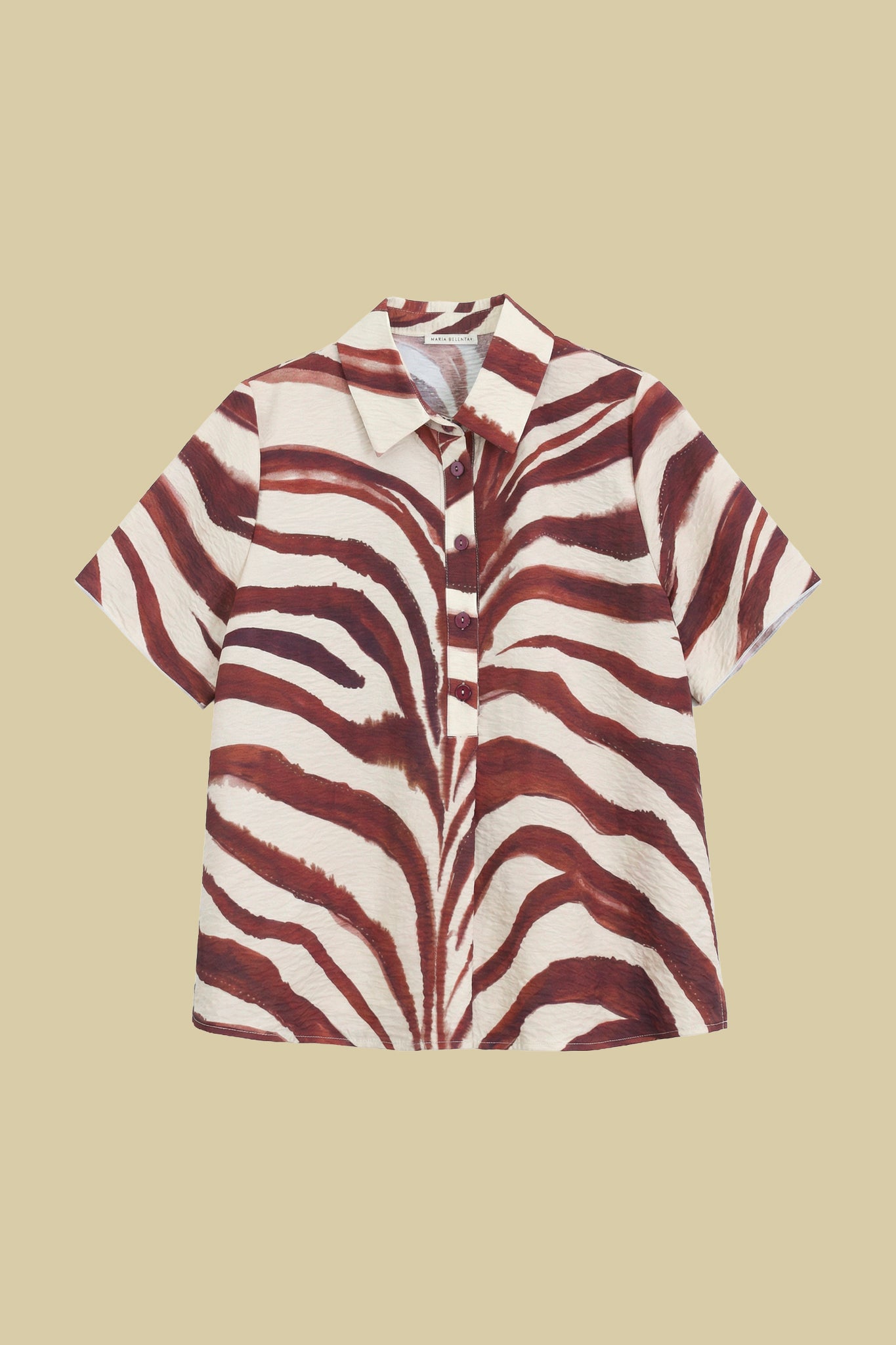 Short-sleeved polo-style blouse with zebra print