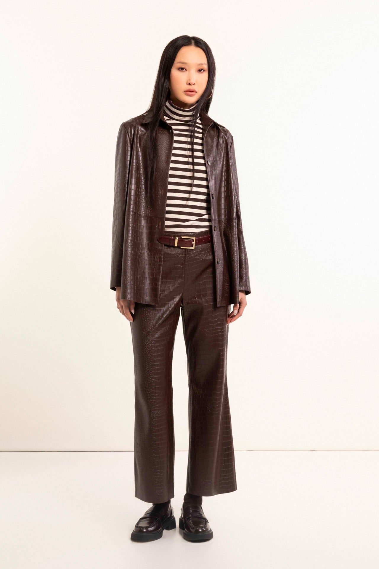 Brown faux leather trumpet trousers