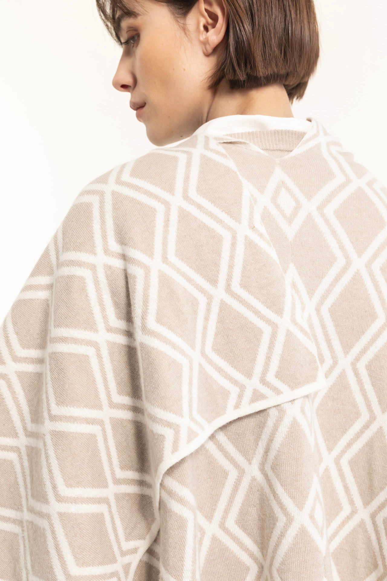 Beige wool blend jacquard cape with geometric pattern