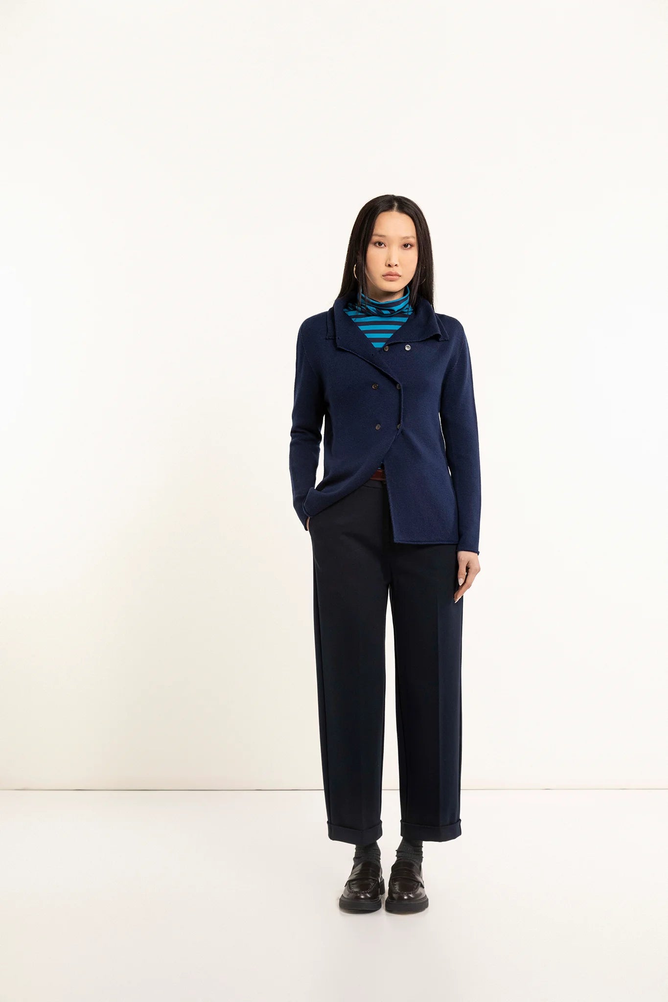 Trousers with cuffs and ironed crease
